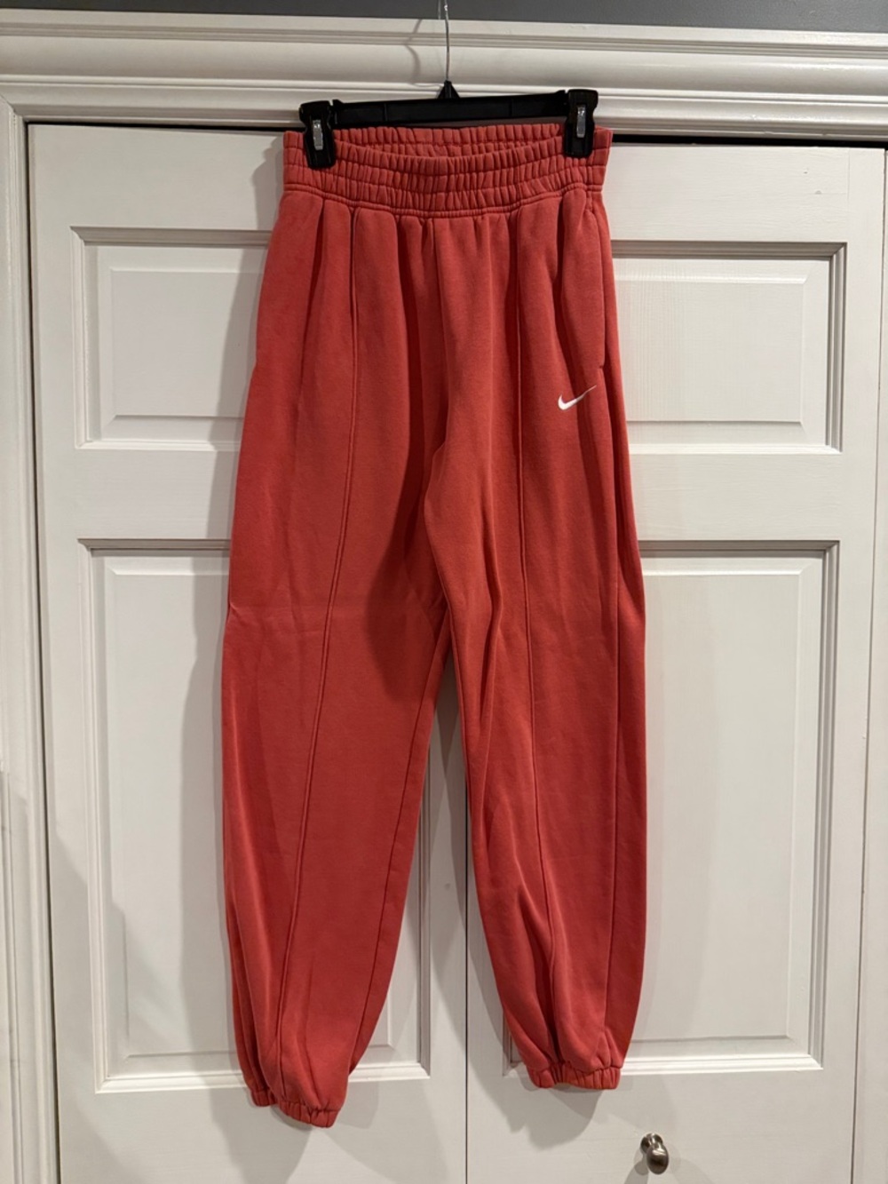 Nike Coral-Red Sweatpants with Swoosh